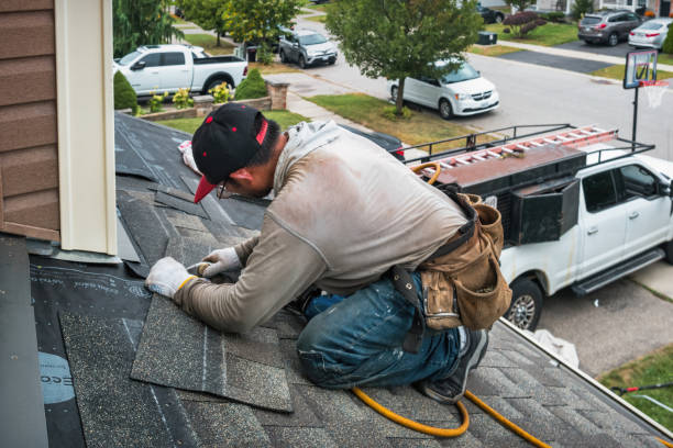 Professional Roofing technician working in East Earl, PA